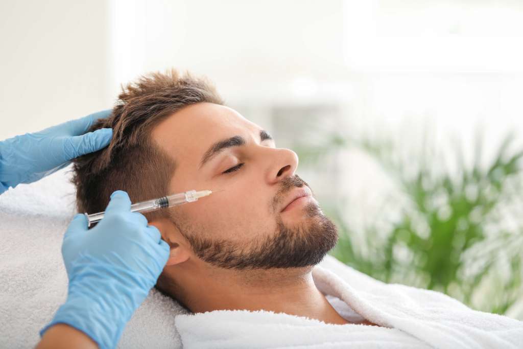 Man Getting Filler Injections in Greensboro